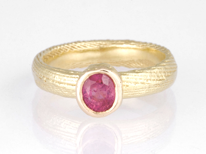 Ruby and 18 carat yellow gold ring